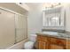 A standard bathroom with granite vanity top and shower/bath combo at 6606 N 46Th Ave, Glendale, AZ 85301