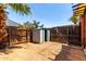 View of the backyard storage shed and fencing at 6606 N 46Th Ave, Glendale, AZ 85301