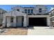 Image showcasing a home under construction with scaffolding around its facade at 7333 W Buckhorn Trl, Peoria, AZ 85383