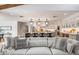 Cozy living room showcases an open floor plan with a view of the kitchen island at 8045 E Del Caverna Dr, Scottsdale, AZ 85258