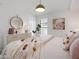 Inviting bedroom with decor, light walls, and hardwood flooring at 8045 E Del Caverna Dr, Scottsdale, AZ 85258