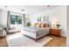 Bright and spacious bedroom with hardwood floors and large windows at 8045 E Del Caverna Dr, Scottsdale, AZ 85258