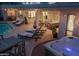 Outdoor patio area with lounge seating, a hot tub and desert landscaping at 8045 E Del Caverna Dr, Scottsdale, AZ 85258