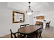Formal dining room is conveniently located next to a breakfast bar and the kitchen at 8651 E Royal Palm Rd # 121, Scottsdale, AZ 85258