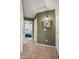 View of a hallway that leads to a bedroom with tile floors and neutral wall tones throughout at 9329 E Olla Ave, Mesa, AZ 85212
