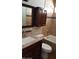 Updated bathroom with granite countertops, modern fixtures, and a tiled shower at 1009 E Hampton Ave, Mesa, AZ 85204