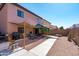 Spacious backyard featuring a patio, grill, pergola, hammock, and decorative gravel at 1017 W Lydia Ln, Phoenix, AZ 85041