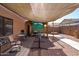 Backyard featuring a covered patio, desert landscaping and a block wall at 1017 W Lydia Ln, Phoenix, AZ 85041