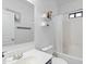 Bright bathroom with vanity and shower-tub combo and white tile at 1017 W Lydia Ln, Phoenix, AZ 85041