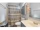 Bathroom featuring a shower with patterned curtain, cabinet and vanity sink at 1017 W Lydia Ln, Phoenix, AZ 85041