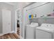 Laundry room with washer and dryer hookups, conveniently located near the bedrooms at 1017 W Lydia Ln, Phoenix, AZ 85041
