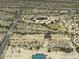 Aerial view of a desert property outlined in yellow, featuring a single-Gathering home and expansive surrounding area at 10772 N Biznaga St, Florence, AZ 85132