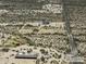 Aerial view of a desert property outlined in yellow, featuring a single-Gathering home and expansive surrounding area at 10772 N Biznaga St, Florence, AZ 85132