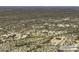 Aerial view of a desert property outlined in yellow, featuring a single-Gathering home and expansive surrounding area at 10772 N Biznaga St, Florence, AZ 85132