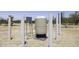 A HydroPro water tank is enclosed with desert views at 10772 N Biznaga St, Florence, AZ 85132