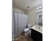 Standard bathroom with a toilet, sink, and shower curtain at 1309 E Julie Ct, San Tan Valley, AZ 85140