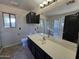 Bathroom featuring a vanity with a large mirror, toilet, and separate shower at 1309 E Julie Ct, San Tan Valley, AZ 85140