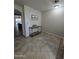 Inviting foyer features tiled flooring, a decorative console table and stylish decor at 1309 E Julie Ct, San Tan Valley, AZ 85140