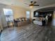 The living room features hardwood floors, ceiling fan, and access to the kitchen at 1309 E Julie Ct, San Tan Valley, AZ 85140