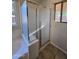 Shower with glass door, next to tub at 1309 E Julie Ct, San Tan Valley, AZ 85140