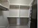Walk-in closet with shelving and wood-look floors at 1309 E Julie Ct, San Tan Valley, AZ 85140
