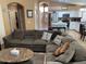 Inviting living room features an open floor plan with view to the kitchen and comfortable seating at 1417 E Century Ave, Gilbert, AZ 85296