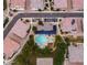 Aerial view of a community pool and recreation area surrounded by well-maintained homes at 14870 W Encanto Blvd # 1059, Goodyear, AZ 85395