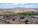 Aerial view of the community showcasing the homes and surrounding landscape at 14870 W Encanto Blvd # 1059, Goodyear, AZ 85395