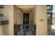 Inviting front entry with secure gate and stylish door at 14870 W Encanto Blvd # 1059, Goodyear, AZ 85395