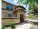 Charming front entrance featuring a private courtyard and gated access to this lovely home at 14870 W Encanto Blvd # 1059, Goodyear, AZ 85395