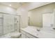 Bright bathroom featuring a glass-enclosed shower and a large vanity at 15505 W Corte Del Sol Este --, Waddell, AZ 85355