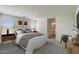 Bright bedroom features two windows, soft carpet and neutral decor at 15505 W Corte Del Sol Este --, Waddell, AZ 85355