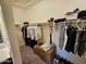 Walk-in closet featuring ample storage space, shelves, and organization at 1630 E Prickly Pear Pl, Casa Grande, AZ 85122