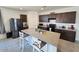 Spacious kitchen featuring a large island, stainless steel appliances, and modern countertops at 1630 E Prickly Pear Pl, Casa Grande, AZ 85122