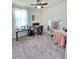 Functional office space featuring desk, chair, and ample natural light at 1630 E Prickly Pear Pl, Casa Grande, AZ 85122