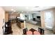 Expansive open-concept kitchen with stainless steel appliances, tile floors, and modern design at 16526 W Calle Lejos --, Surprise, AZ 85387