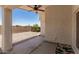 Covered patio with fan provides a comfortable space for outdoor enjoyment at 16827 S 20Th Way, Phoenix, AZ 85048