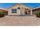 Back of house features desert landscaping and covered patio at 16827 S 20Th Way, Phoenix, AZ 85048