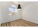 Bright and spacious bedroom with natural light and wood-look laminate floors at 16827 S 20Th Way, Phoenix, AZ 85048