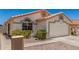 Charming single-story home with a two-car garage and well-maintained landscaping at 16827 S 20Th Way, Phoenix, AZ 85048