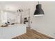 Bright kitchen features white cabinets, quartz countertops, and stainless steel sink at 16827 S 20Th Way, Phoenix, AZ 85048
