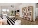 Stylish living room with neutral tones, modern furnishings and a ceiling fan at 16827 S 20Th Way, Phoenix, AZ 85048