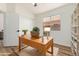 Cozy office with a bright window and built-in shelves for a productive work environment at 16827 S 20Th Way, Phoenix, AZ 85048