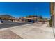 Neighborhood street view with desert landscaping, mountain views, and clear sky at 16827 S 20Th Way, Phoenix, AZ 85048