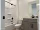 Bathroom with a shower-tub combo, modern vanity, and sleek fixtures at 18243 W La Senda Dr, Surprise, AZ 85387