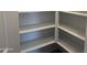 Spacious walk-in pantry with multiple shelving units at 18243 W La Senda Dr, Surprise, AZ 85387