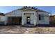 Exterior shot of a home under construction with visible framework and materials at 18260 W Camino De Oro --, Surprise, AZ 85387