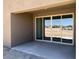 Covered patio featuring a large sliding glass door with neighborhood views at 18260 W Camino De Oro --, Surprise, AZ 85387