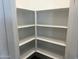 Walk-in pantry with multiple rows of shelving at 18265 W La Senda Dr, Surprise, AZ 85387