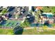 Aerial view of community amenities: basketball, pickleball, pool, playground, and parking at 18271 W La Senda Dr, Surprise, AZ 85387